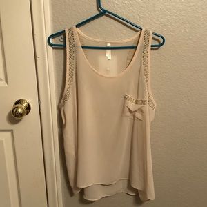 sleeveless sheer blouse